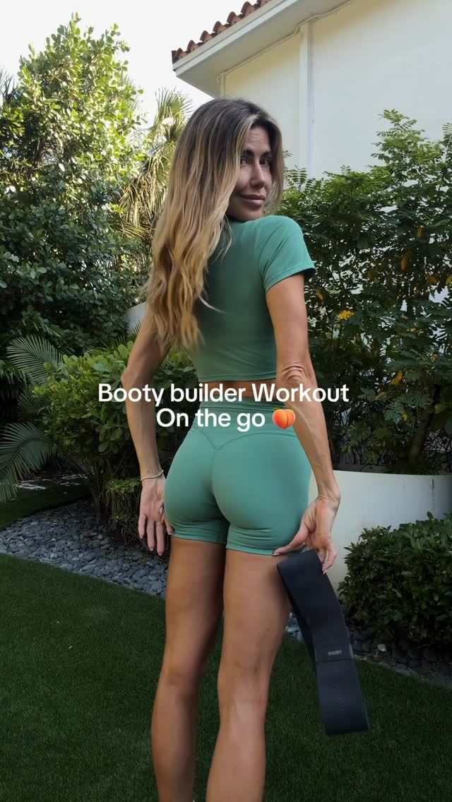 athletic sage green athletic wear set — crew neck crop top, short sleeves, high-waisted biker shorts, V-shaped back seam on shorts