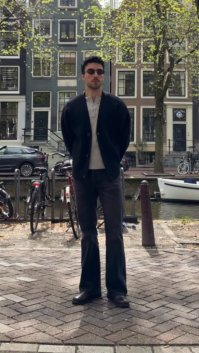 casual black cardigan — v-neck, button-front, dropped shoulders
