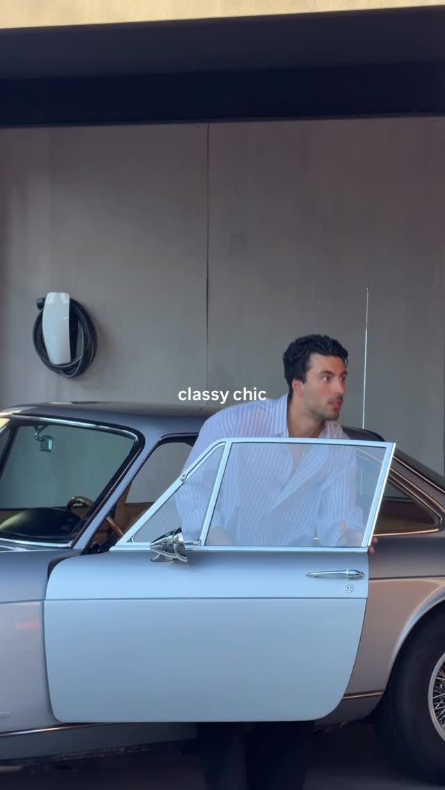 casual light blue and white button-down shirt — button-down collar, long sleeves, unbuttoned