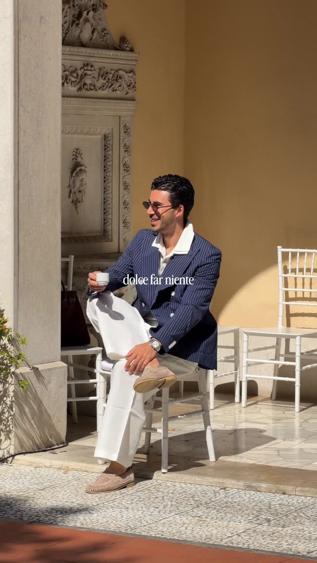 luxury navy blue blazer — double-breasted, peak lapels, white pinstripes, gold buttons