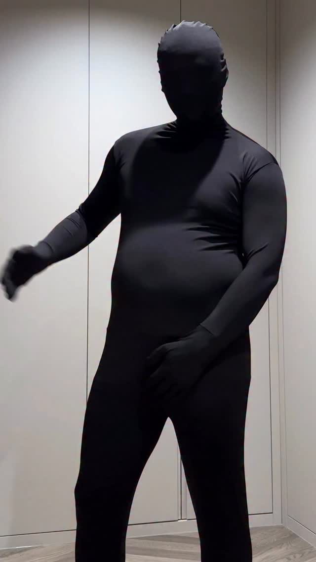 costume black zentai suit — full coverage, integrated gloves and hood, seamless appearance