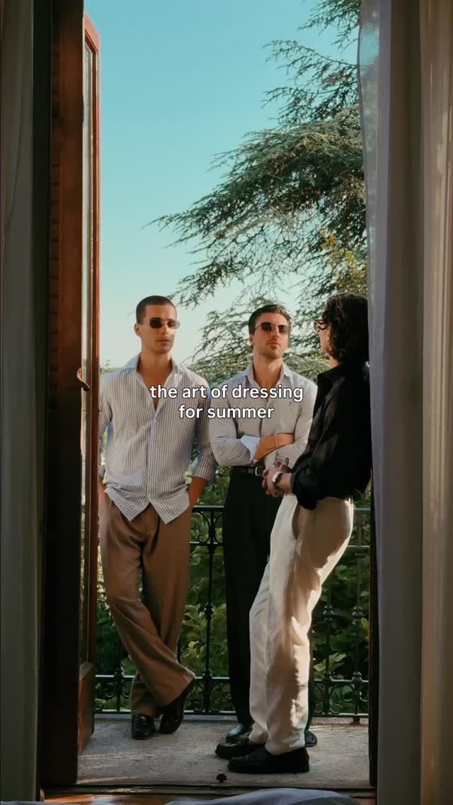 resort wear light blue and white button-up shirt — button-down collar, long sleeve, unbuttoned at collar