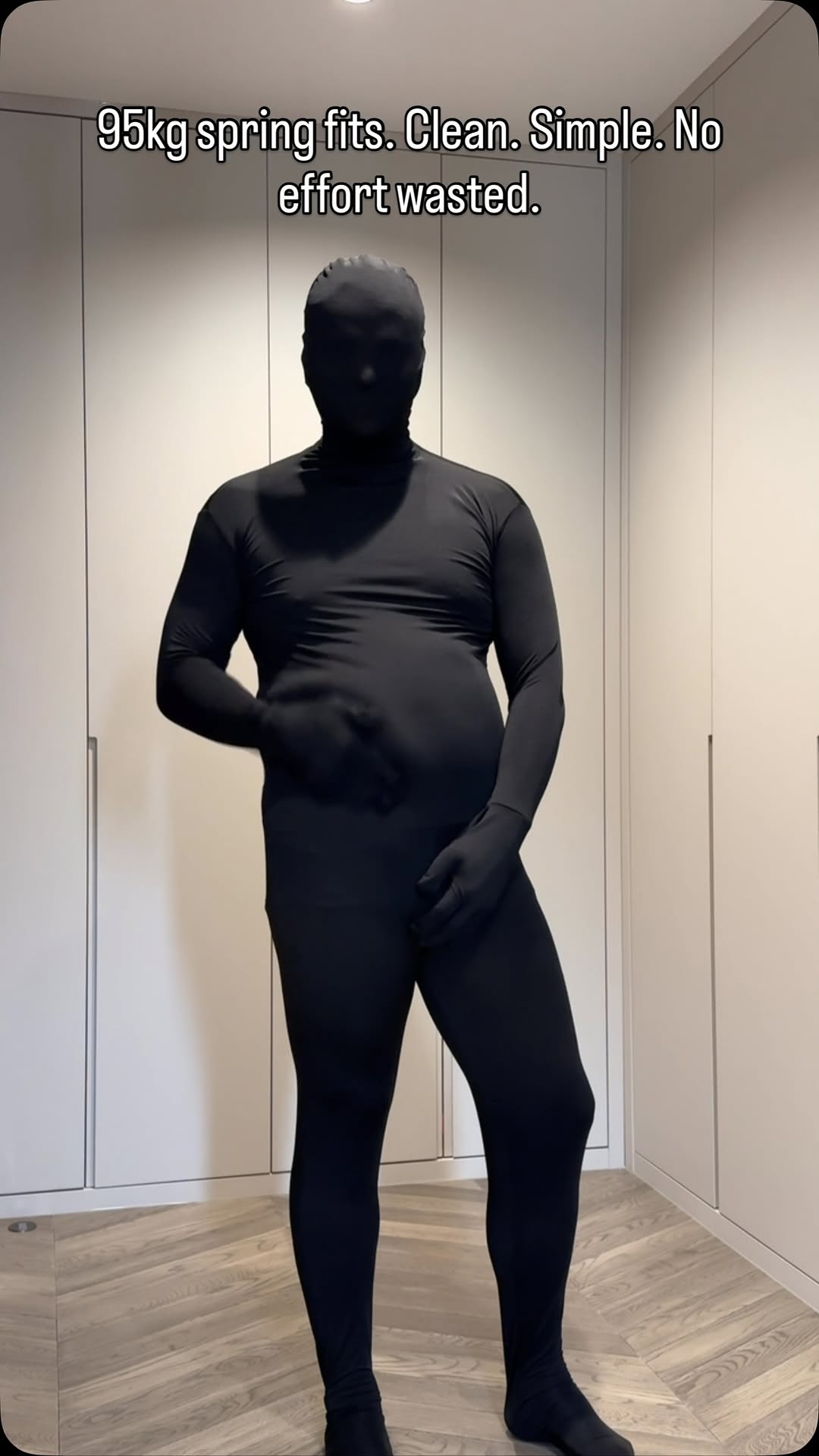 minimalist black bodysuit — full coverage, long sleeve, high neck, integrated gloves and socks, face covering