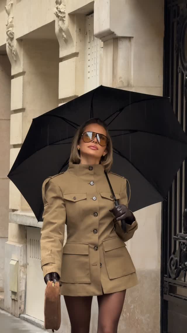 luxury khaki safari jacket — high collar, button-front, four flap pockets, shoulder epaulets, puffed shoulders, long sleeves, peplum waist