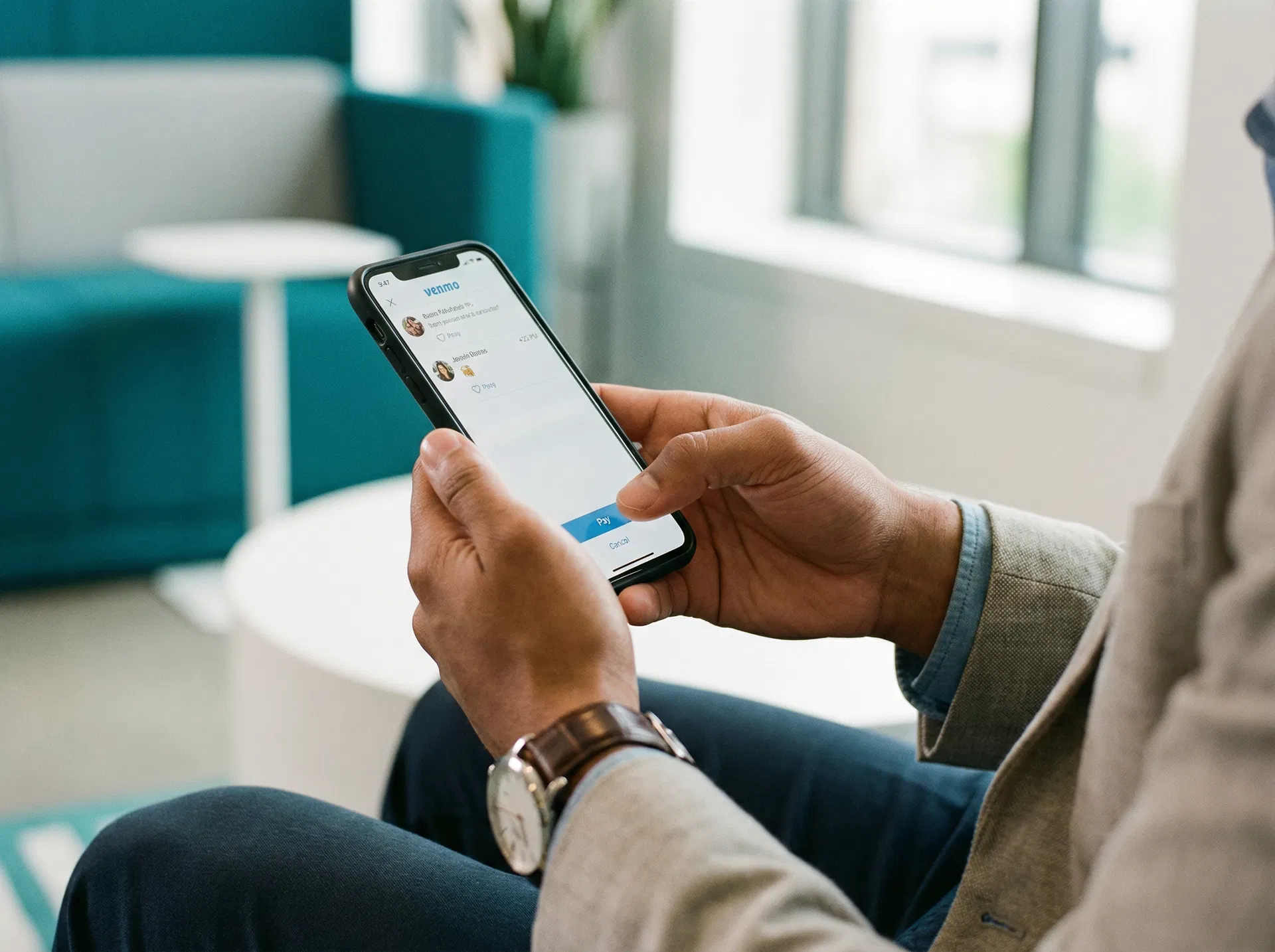 Person paying storage bill on phone with Venmo