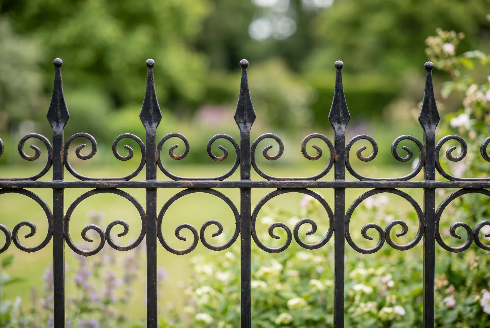 Ornamental garden railing with scroll detail
