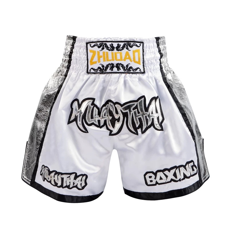 Front view of the white and silver two-tone custom Muay Thai shorts