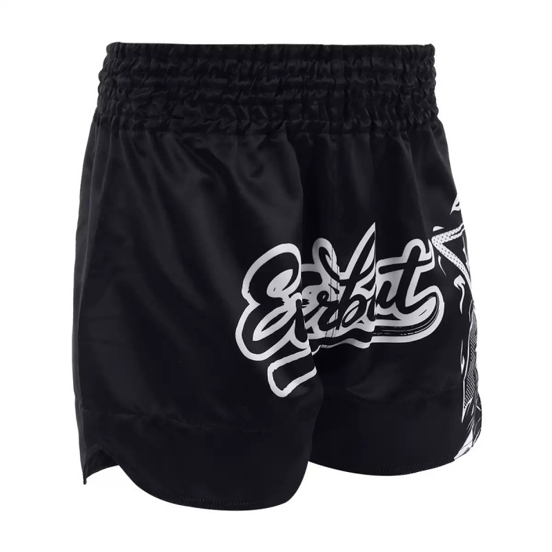 Front view of custom black and white Muay Thai shorts