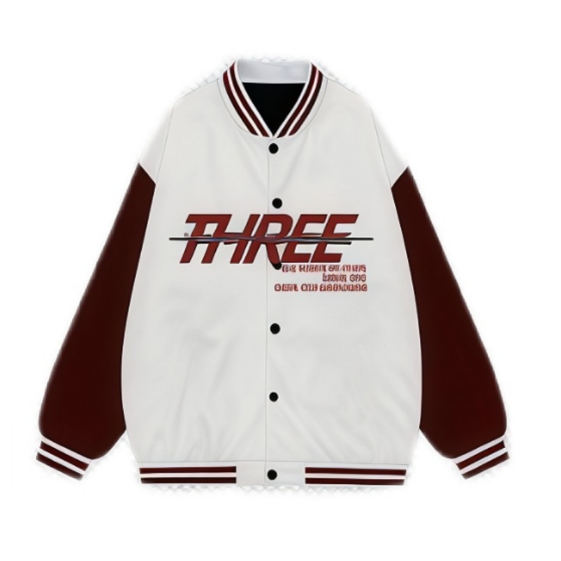 一件白色與酒紅色撞色的熱昇華棒球外套，胸前印有「THREE」字樣及其他英文字句。