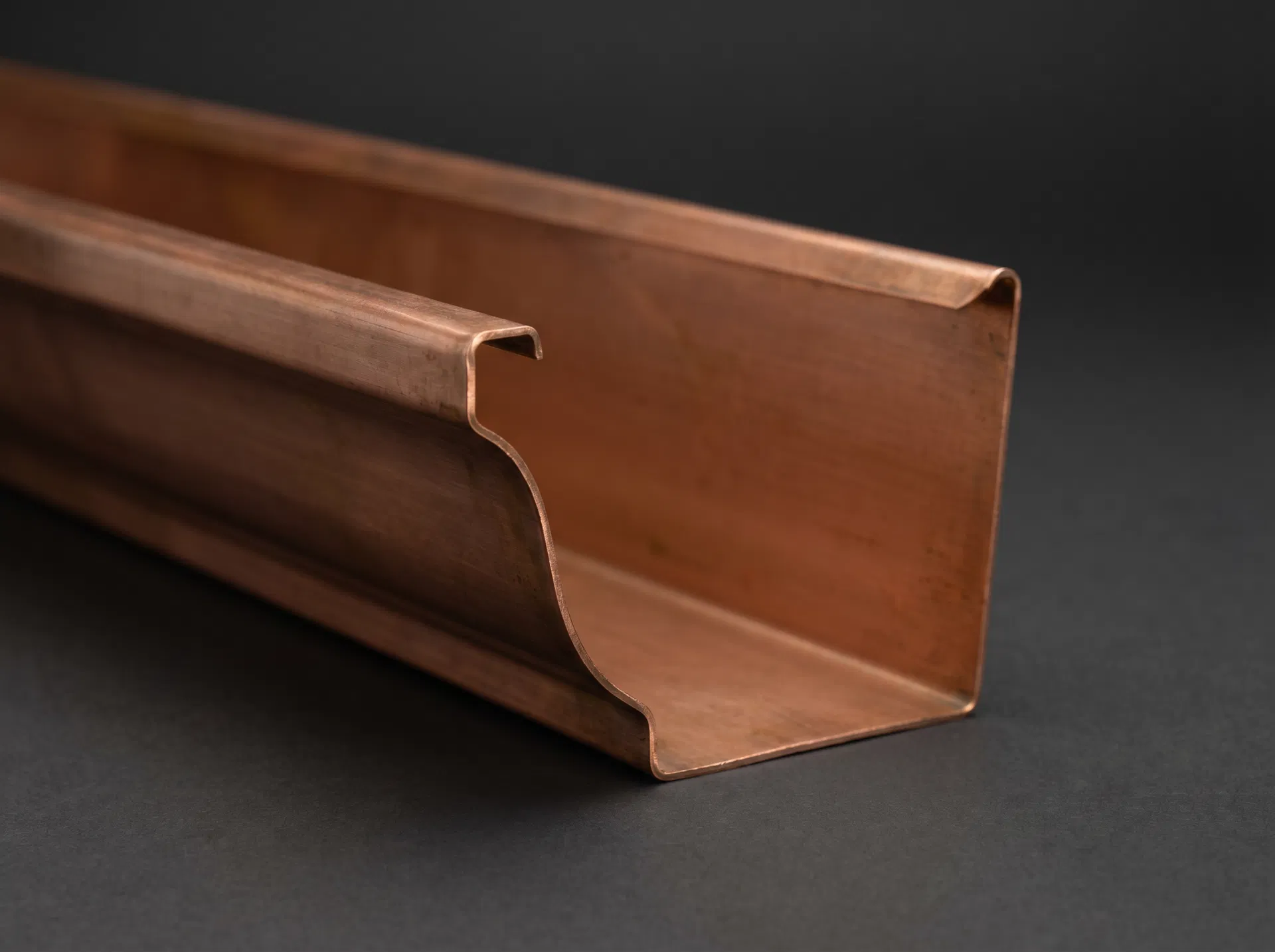 6" OG / K-Style seamless rain gutter profile — Ogee curved front face, wider channel