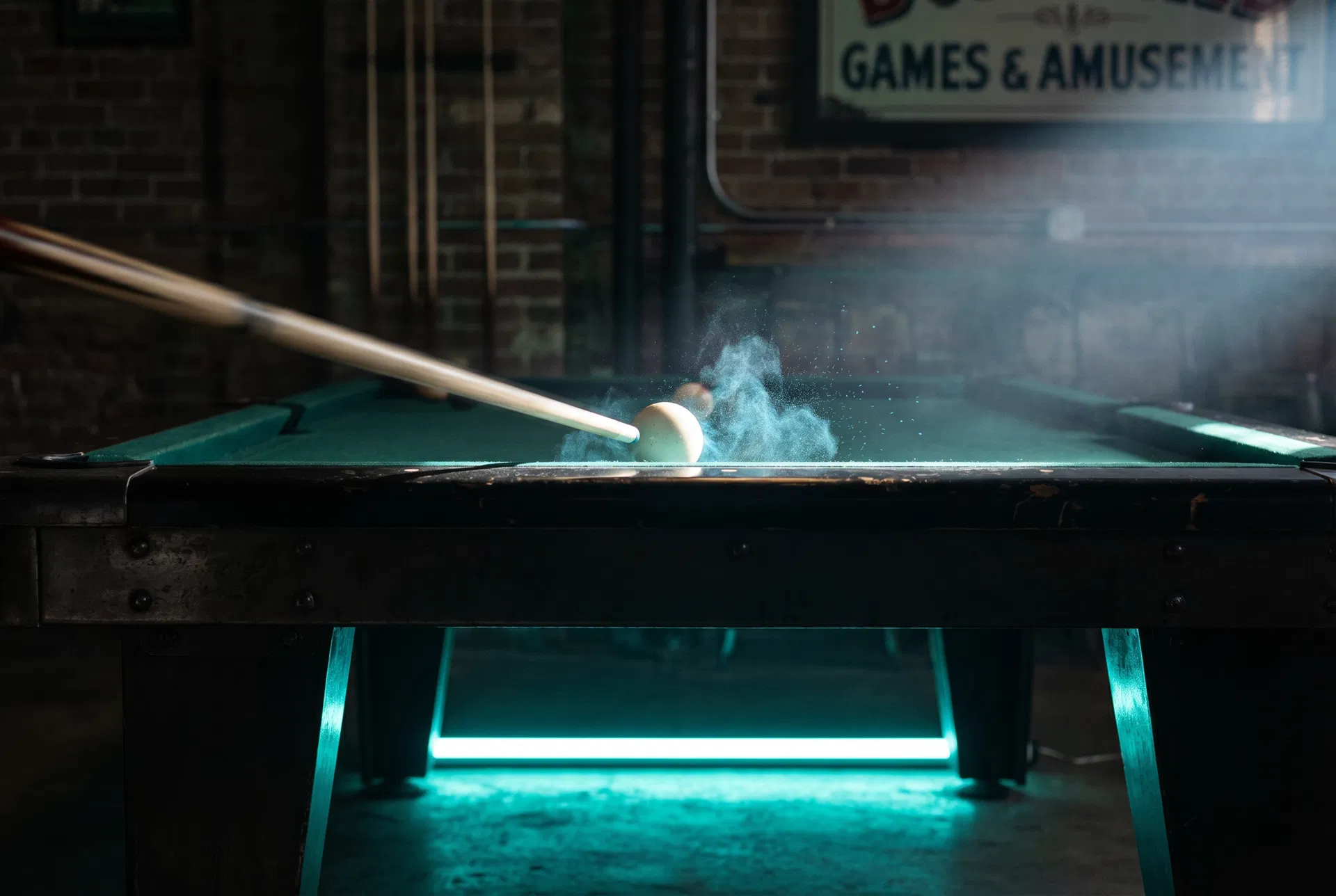 Pool cue striking cue ball