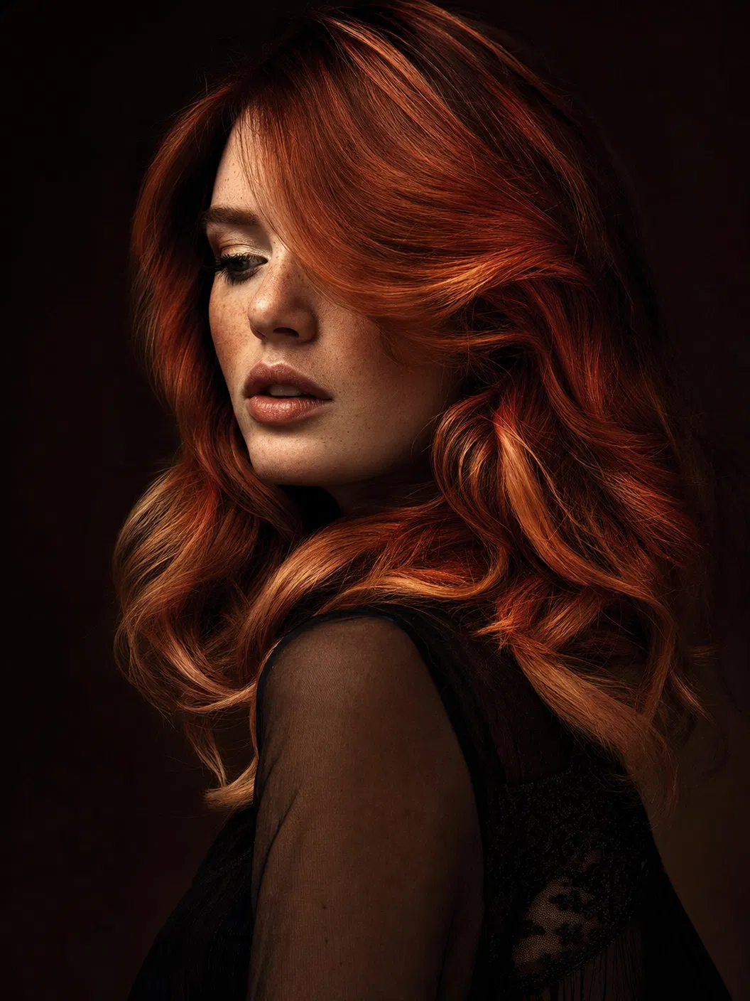 Dimensional copper hair colour by Artecore Salon Grand Rapids