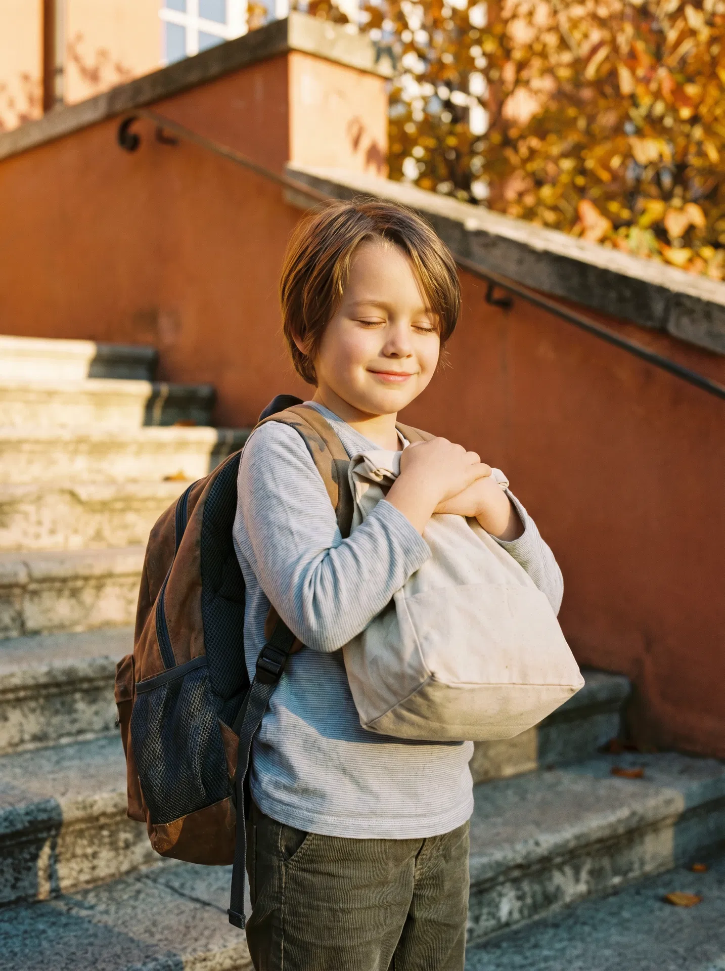 Child holding food bag