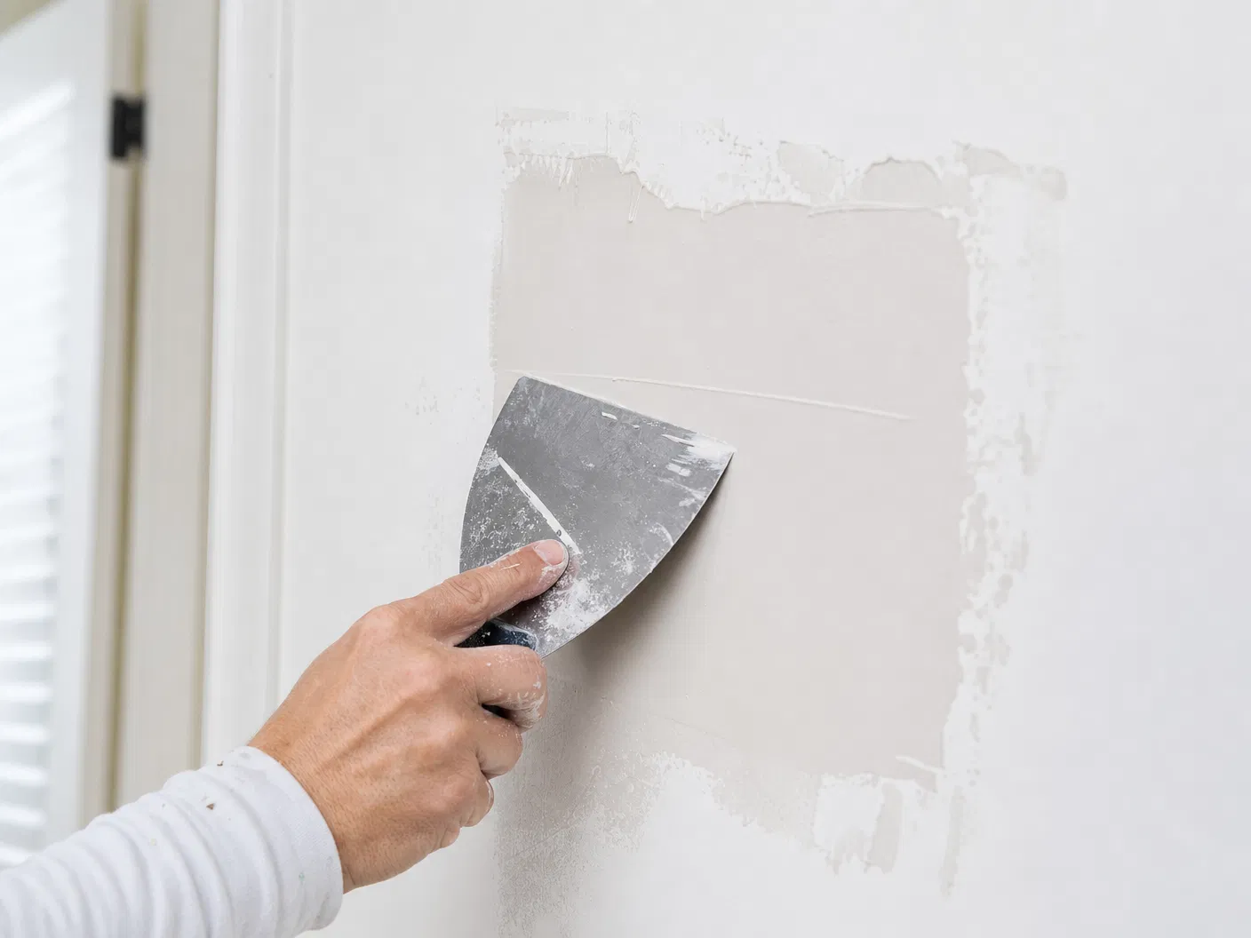 Drywall Repair & Patching Service — Drywall Texture Pros | Ocala, FL Drywall patch repair on a residential wall in Ocala, FL showing seamless texture-matched finish