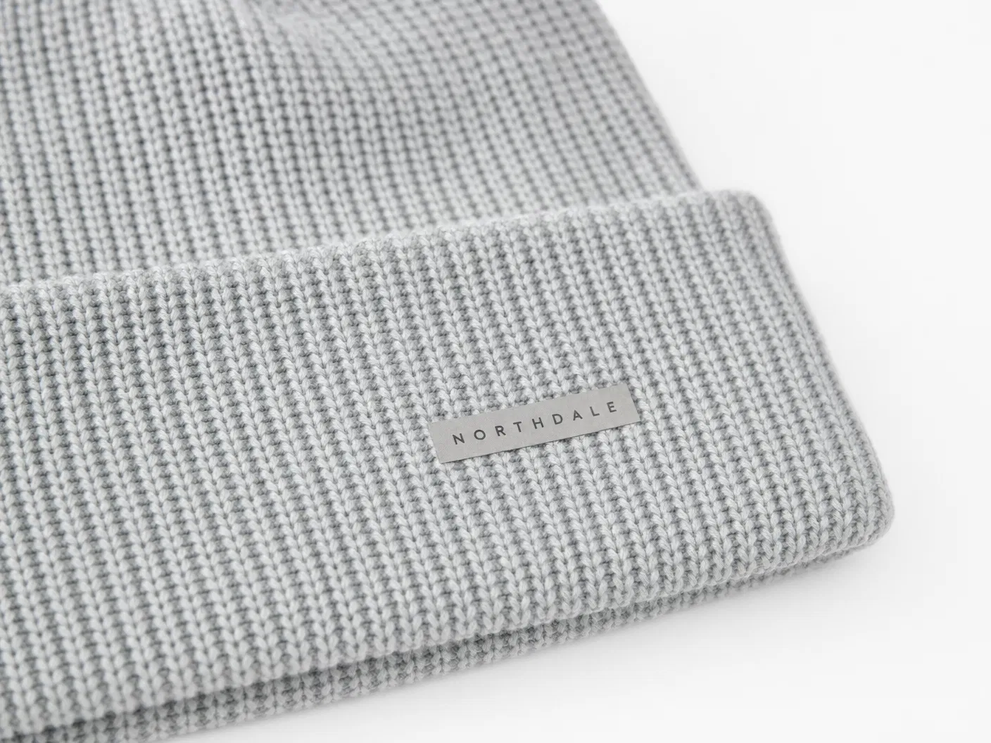 Heat transfer printed label on light grey beanie
