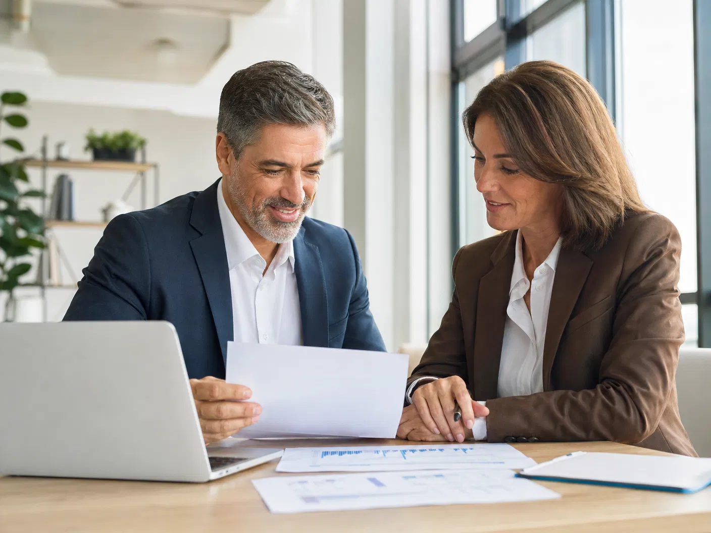 Two professionals reviewing a financial plan together