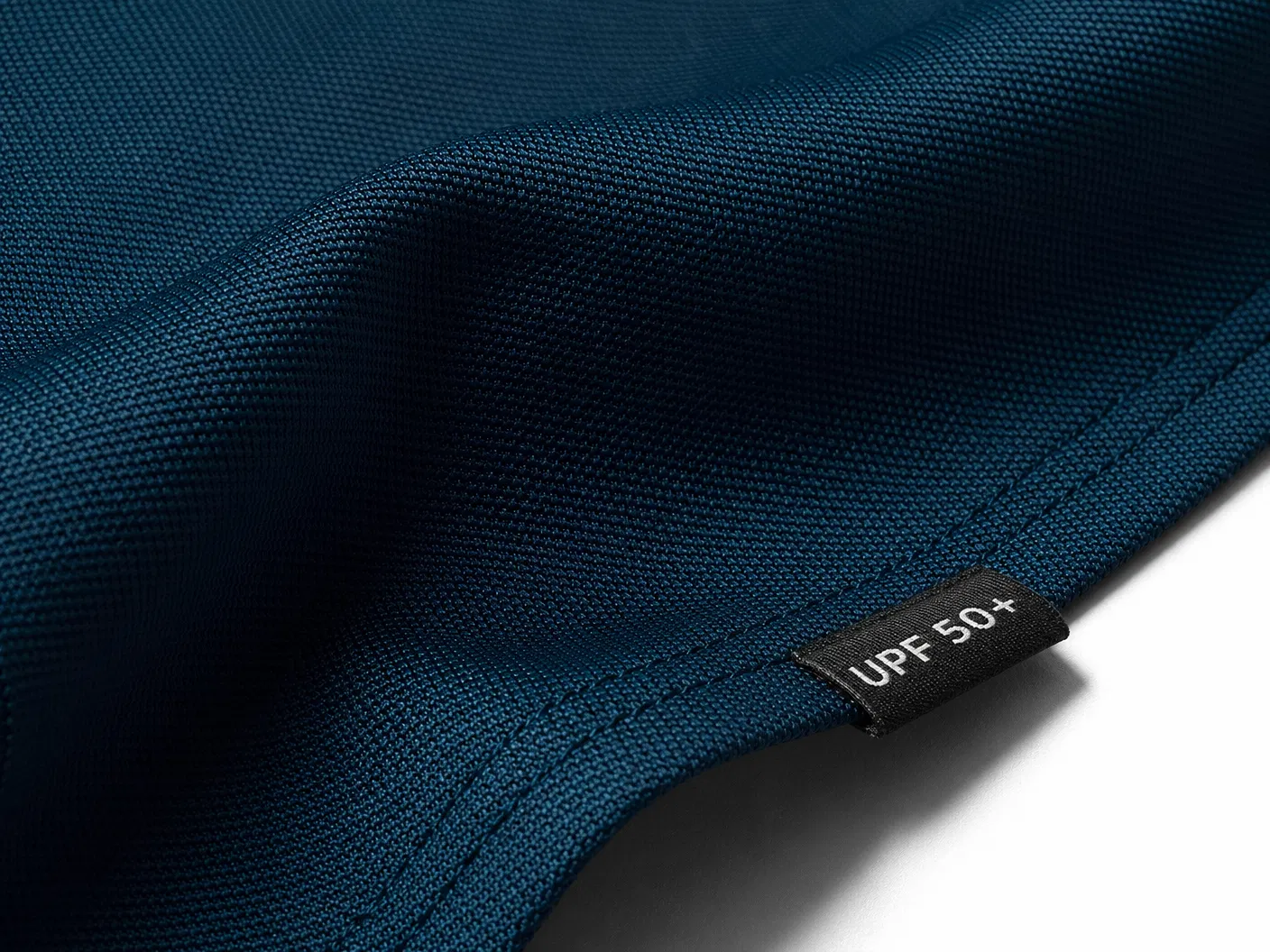 Tecido de prote&ccedil;&atilde;o UV com etiqueta UPF 50+