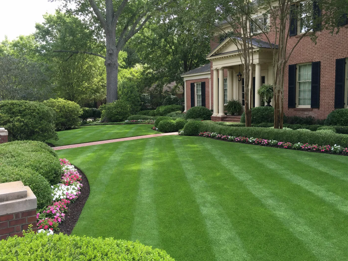 Perfectly maintained front yard with striped lawn
