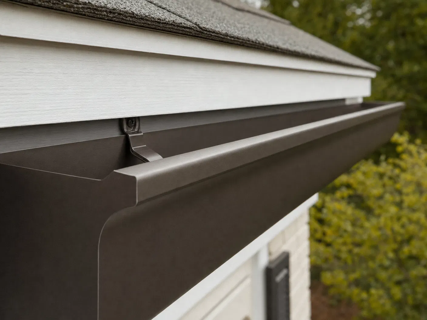 Detailed look at a clean gutter system on a residential home