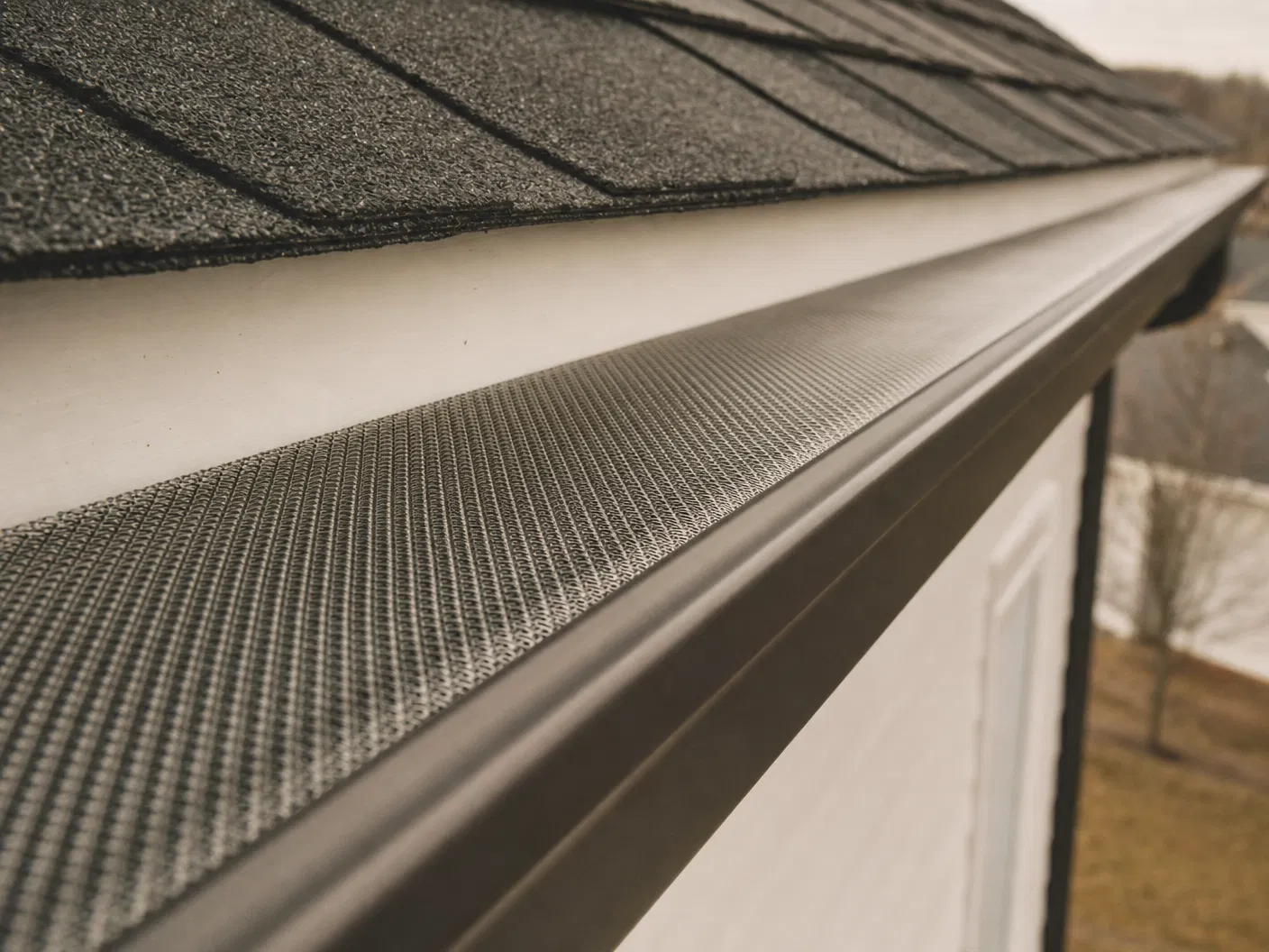 LeafBlaster Pro micro-mesh gutter guard installed on a residential home