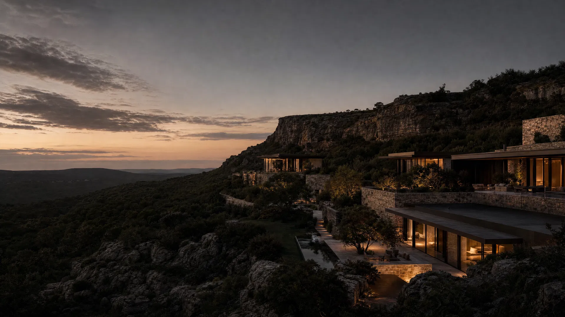 Hill Country limestone estate at dusk