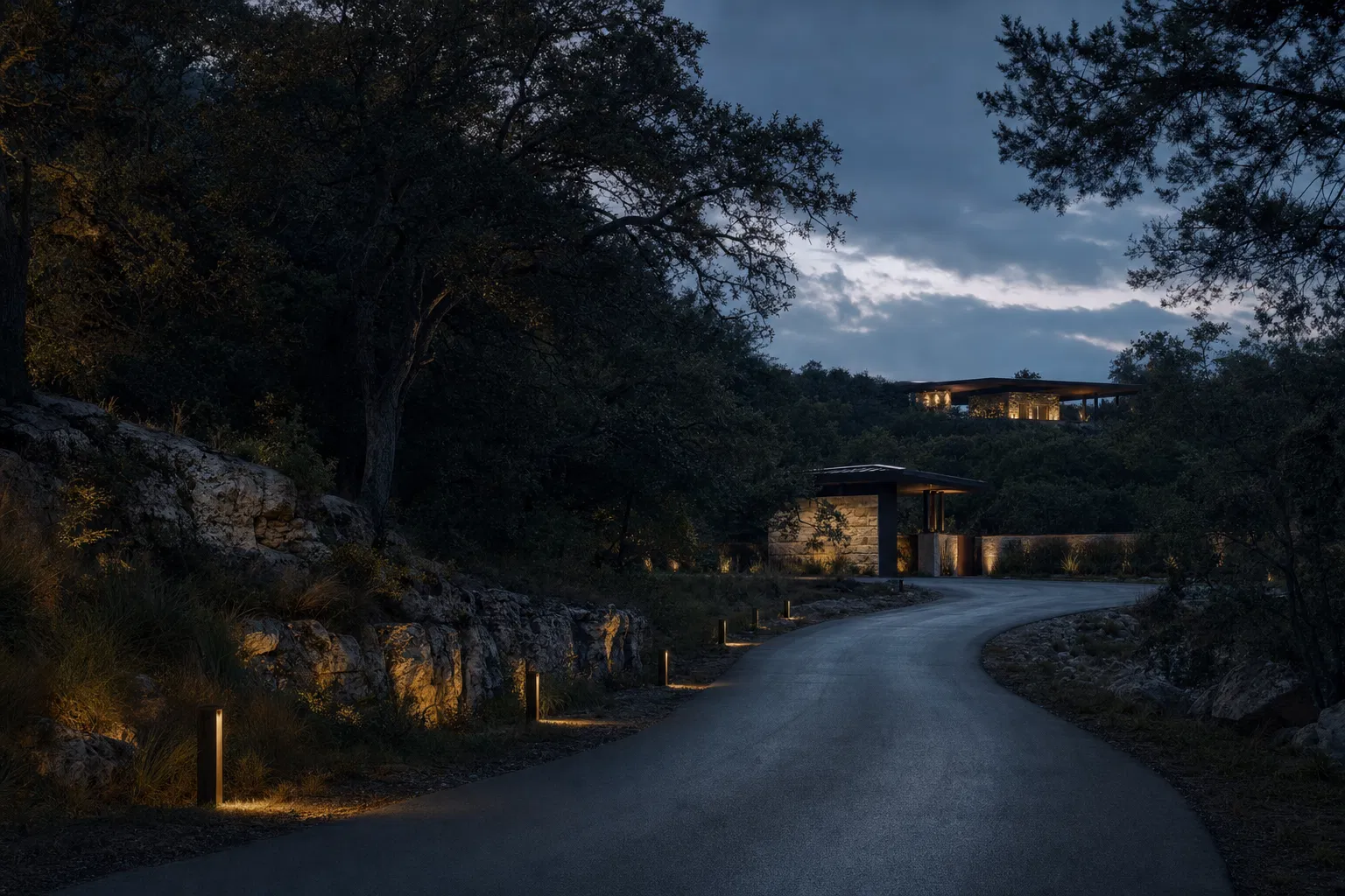 Private Hill Country approach road at dusk