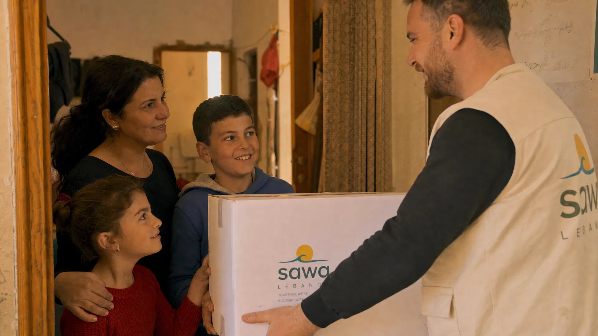 Sawa team delivering supplies