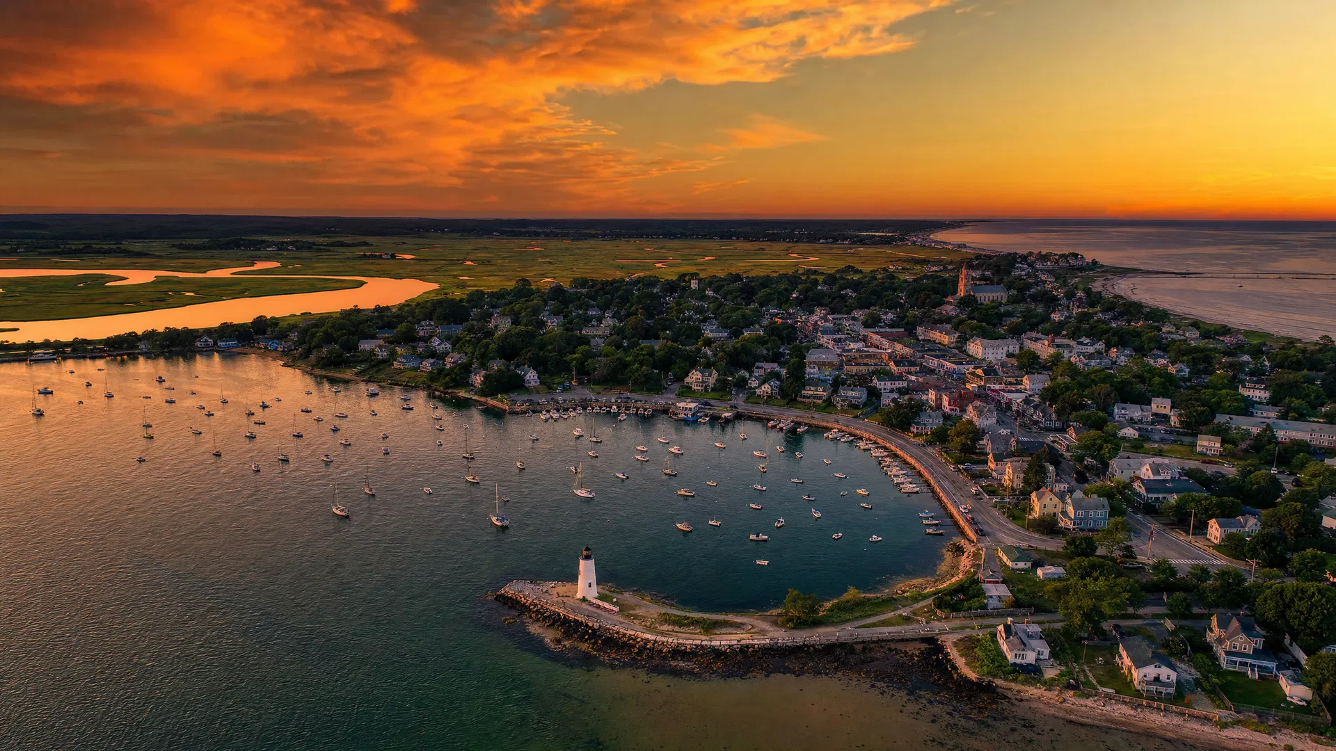 Aerial drone view of Rhode Island coastline at golden hour