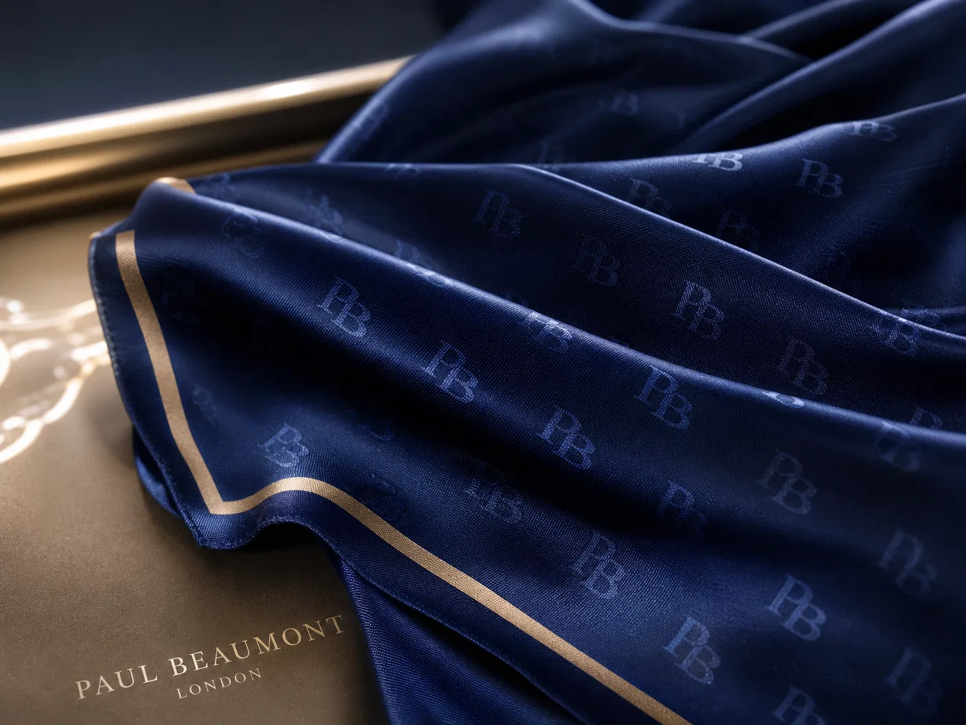 Paw Bougie wearing royal blue silk scarf with gold PB ring