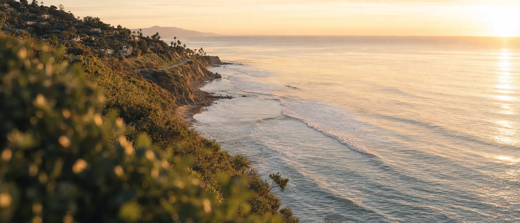 Coastal landscape at sunset representing long-term wealth planning