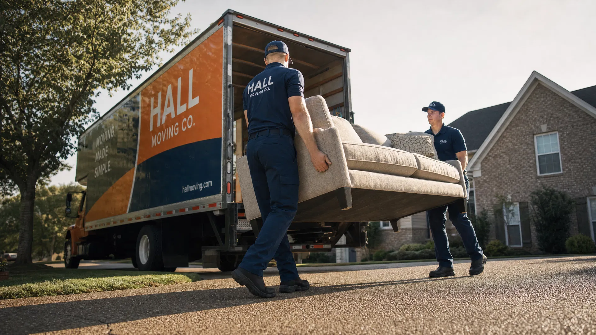 Professional movers loading furniture