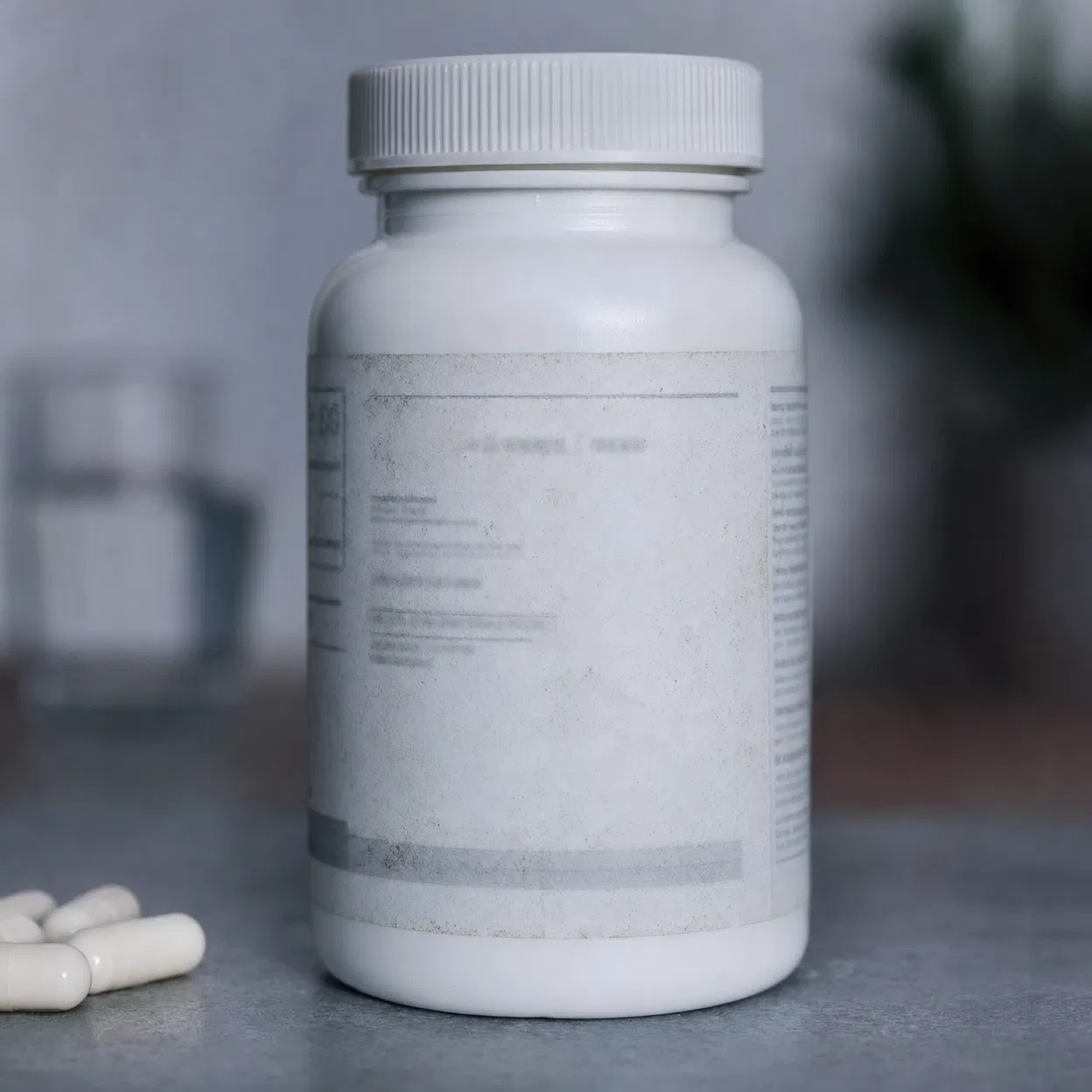 Generic supplement bottle with faded label