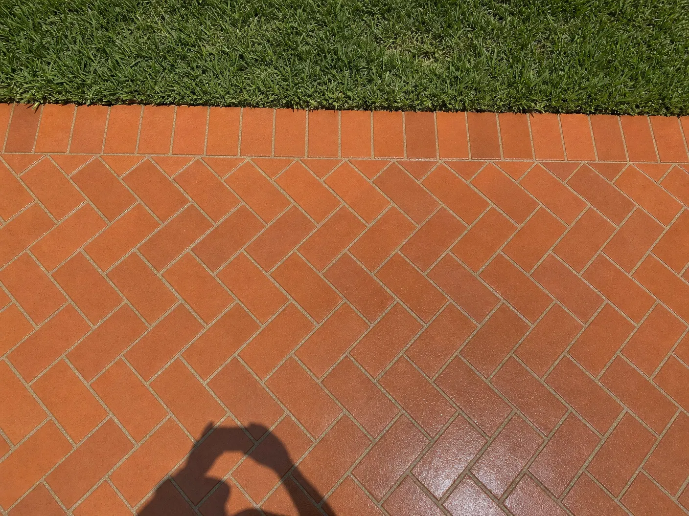 Beautiful clean sealed pavers with vibrant color restored