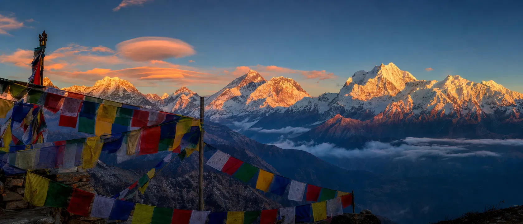 Himalayan mountains at dawn with prayer flags