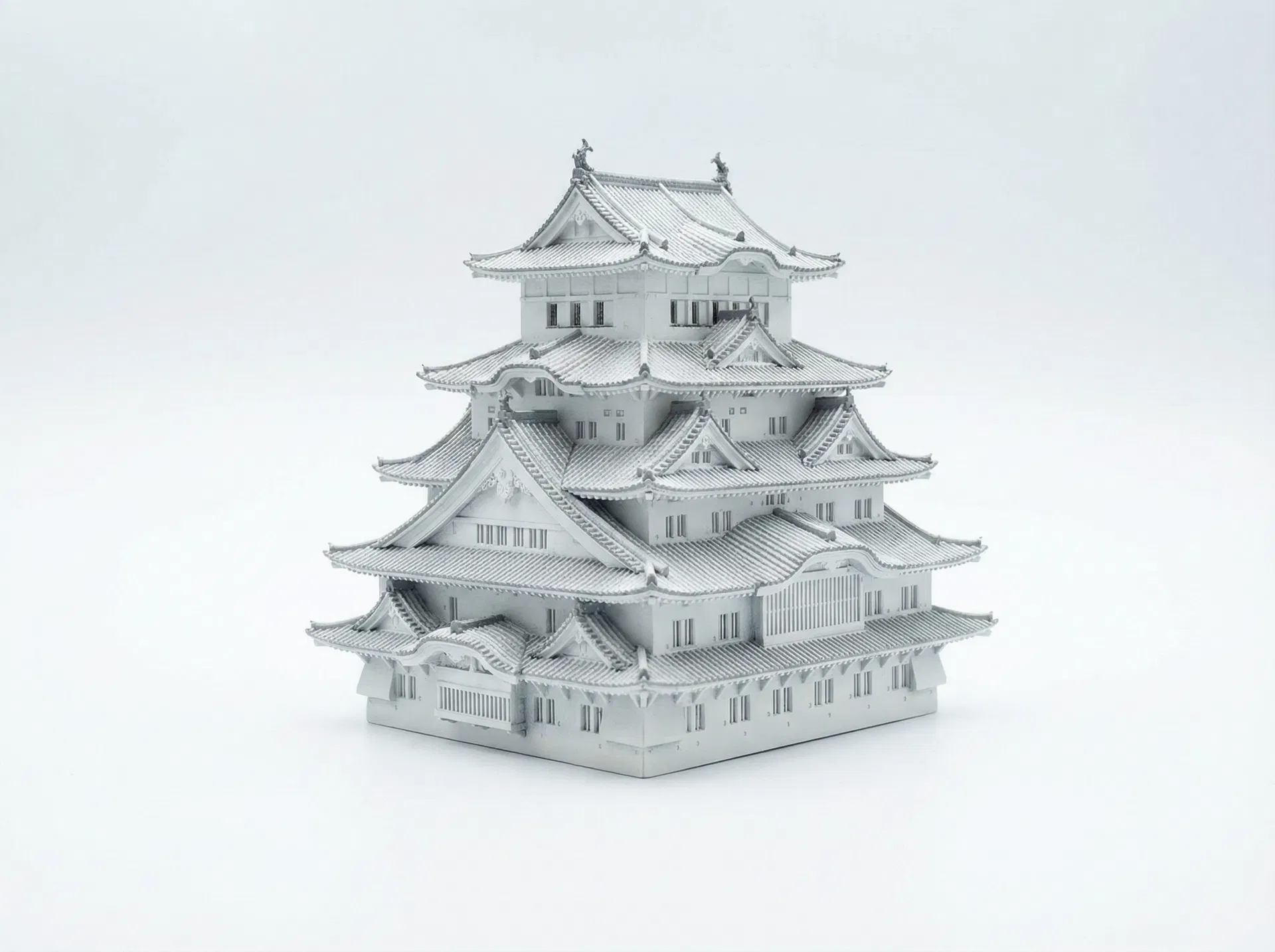 観光地の名所をミニチュア化したご当地フィギュアを土産店で販売