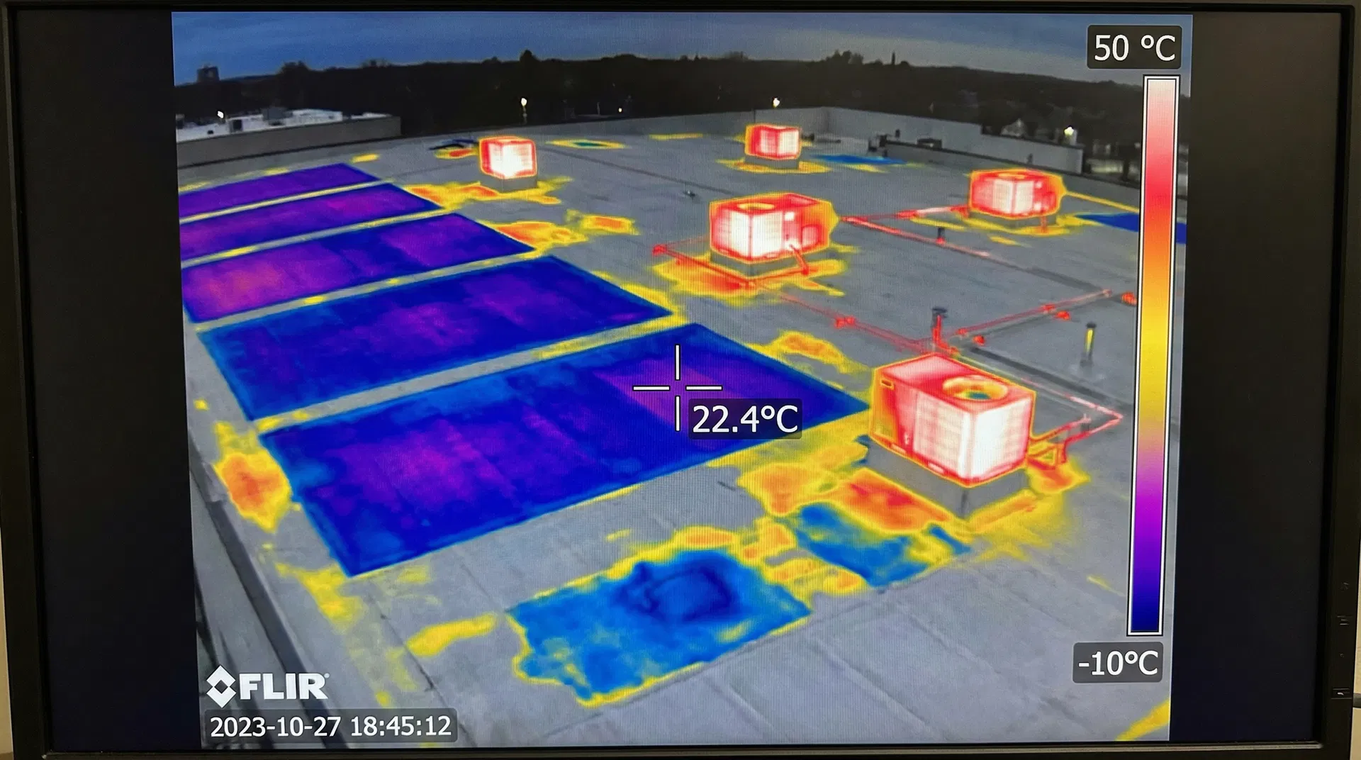 Thermal roof inspection showing heat signatures