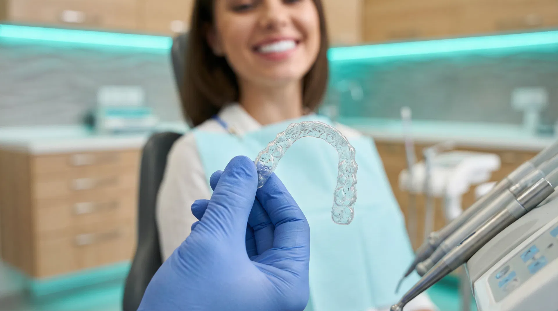 Pediatric dentist treating a child at Qatar Prime Dental Center